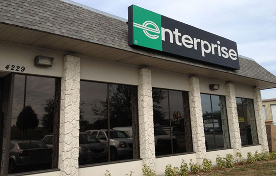 Enterprise storefront with dark tinted windows in Florida
