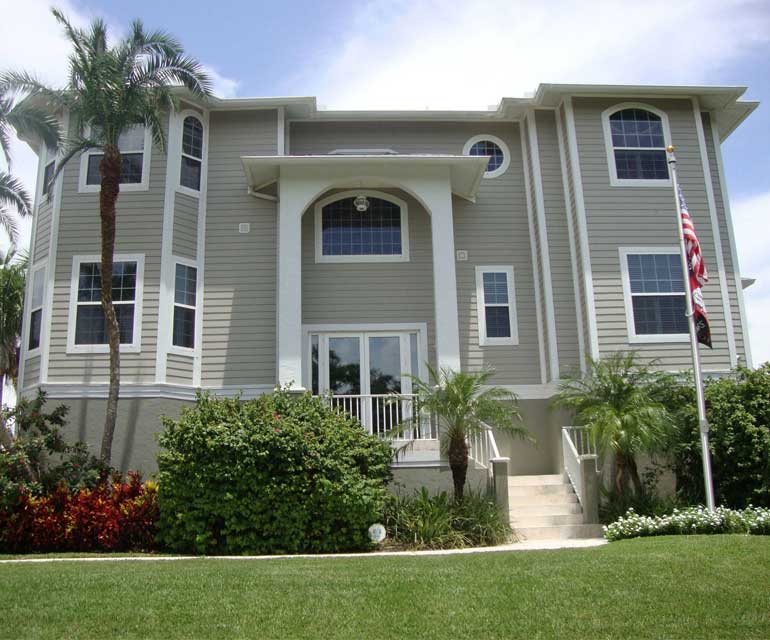 House with window tint in Naples, Florida performed by Suntamers Window Tinting